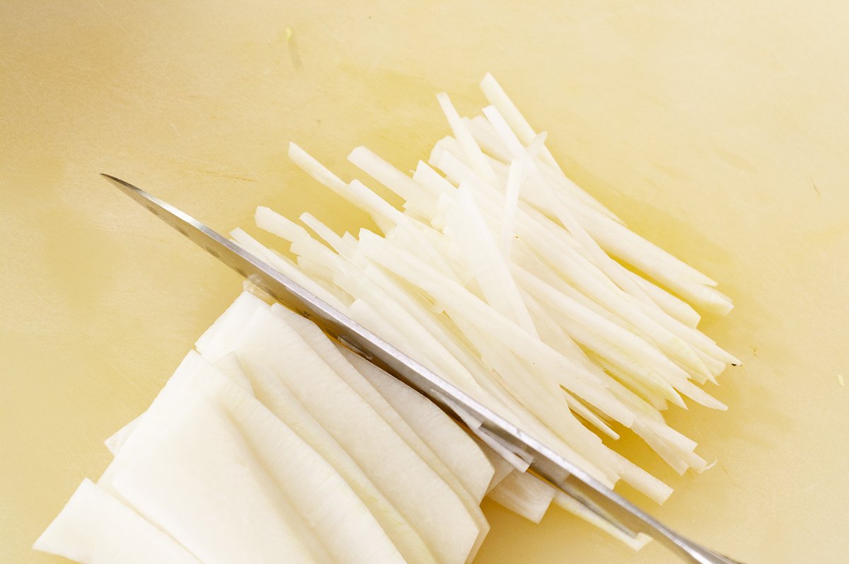 making matchsticks for radish kimchi
