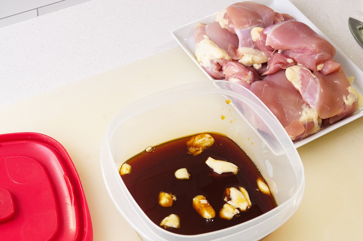 adding garlic to mom's chicken marinade