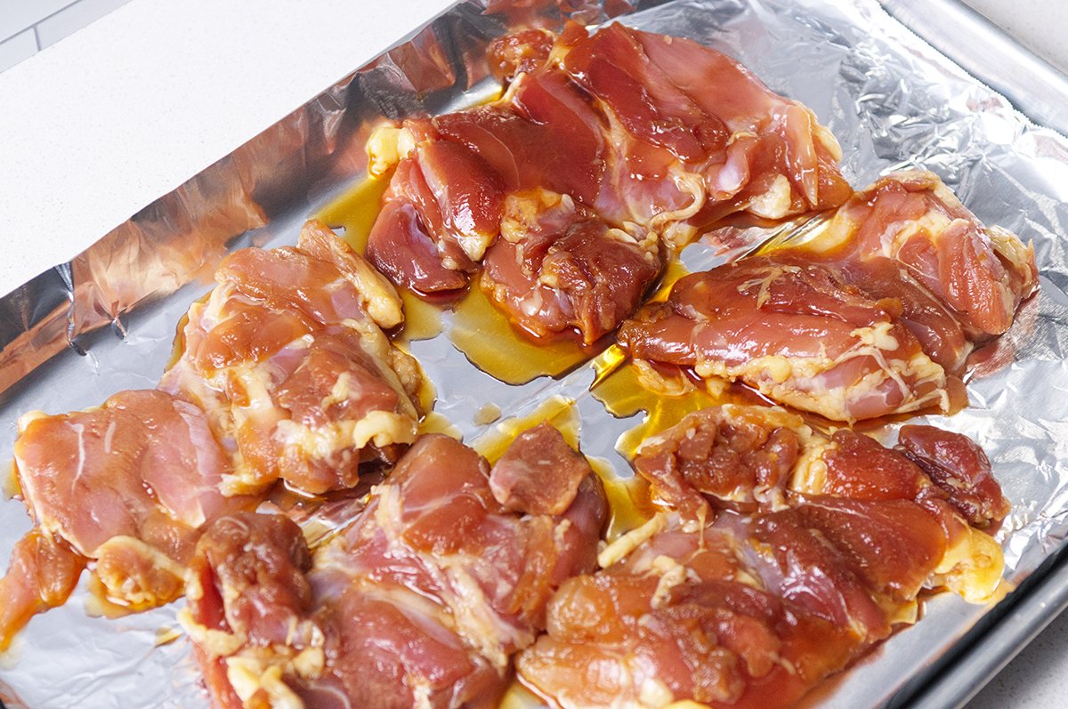 spreading mom's chicken on foil lined pan