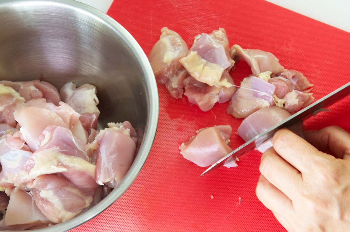 another pic of cutting chicken for japanese fried chicken