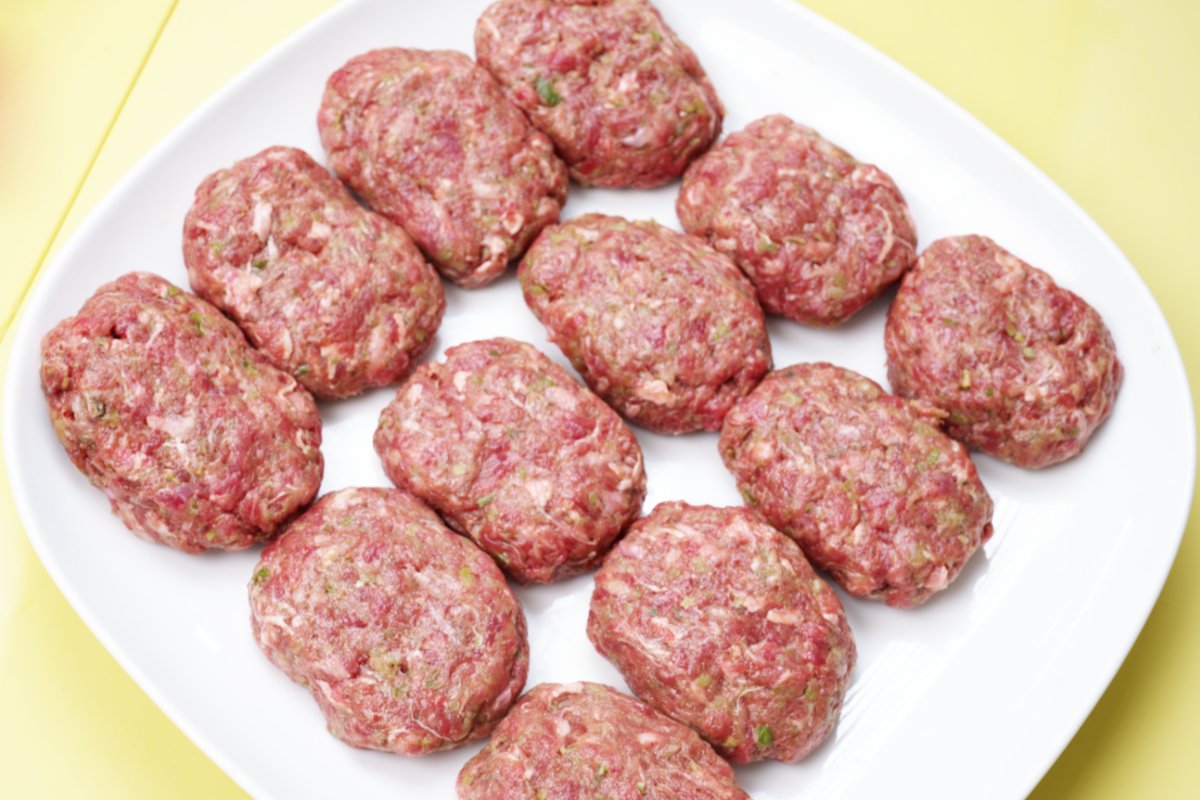 meatballs pressed into oval disks