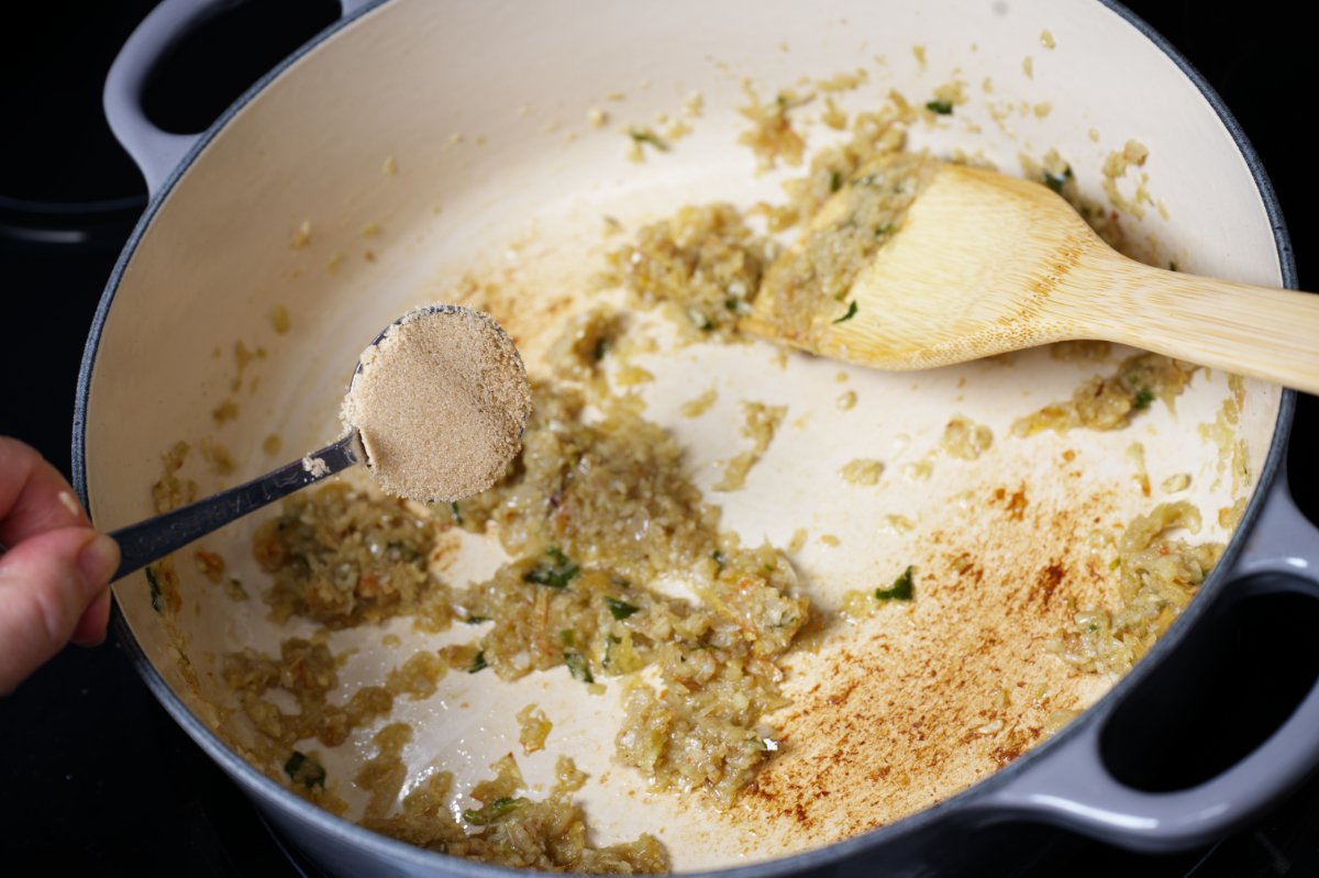 adding sugar to the pan