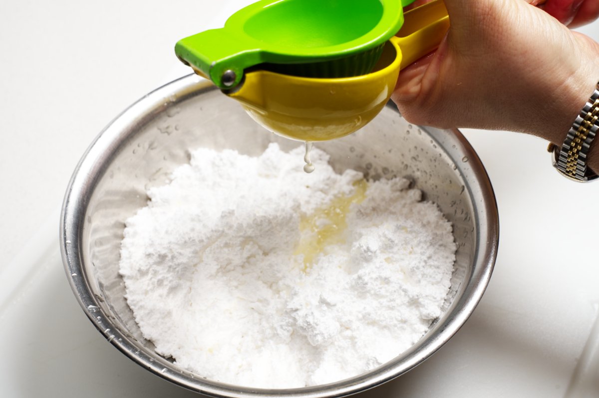 adding juice to powdered sugar