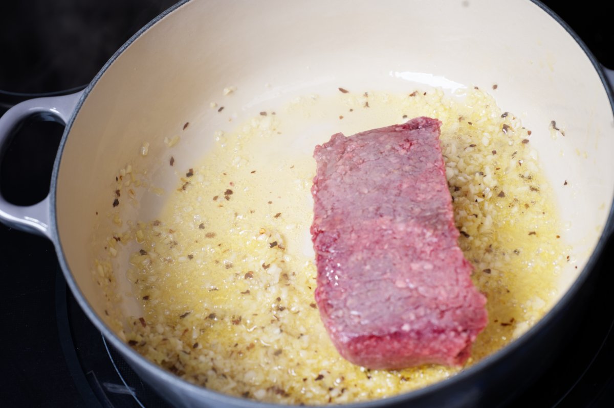 adding the pork