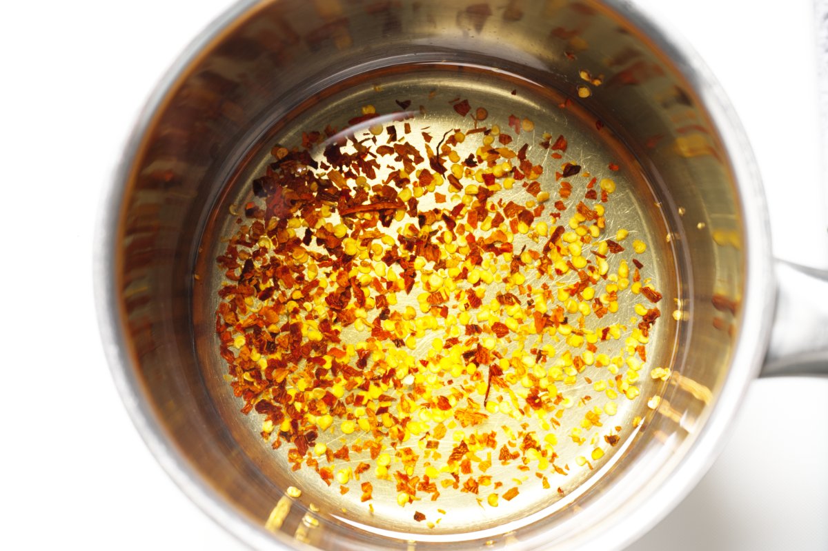 pic of chilis heating in oil for mapo tofu