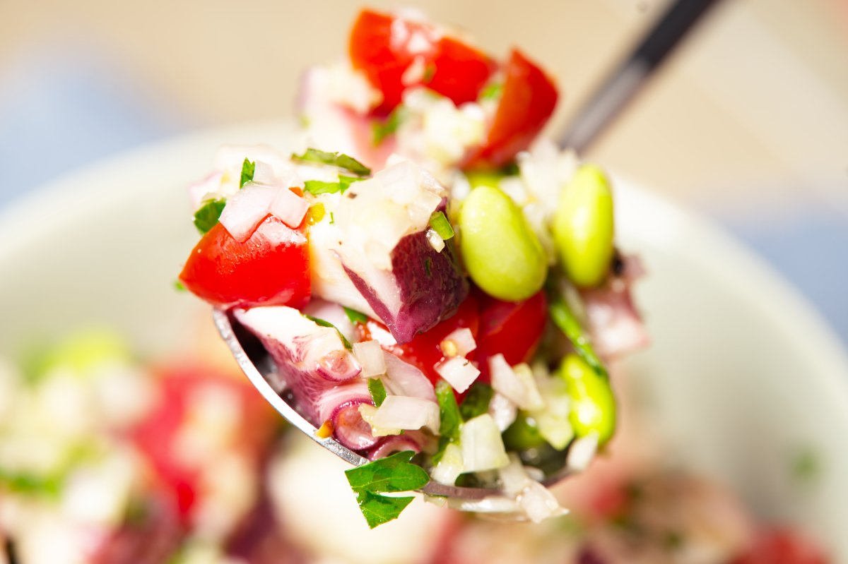 mixed ceviche on a fork