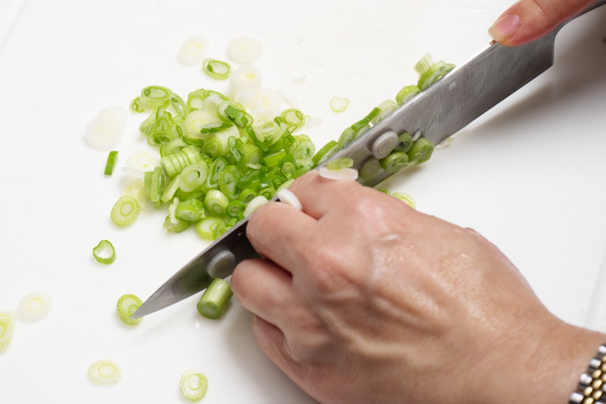 cutting scallions crispy shrimp dumpling 