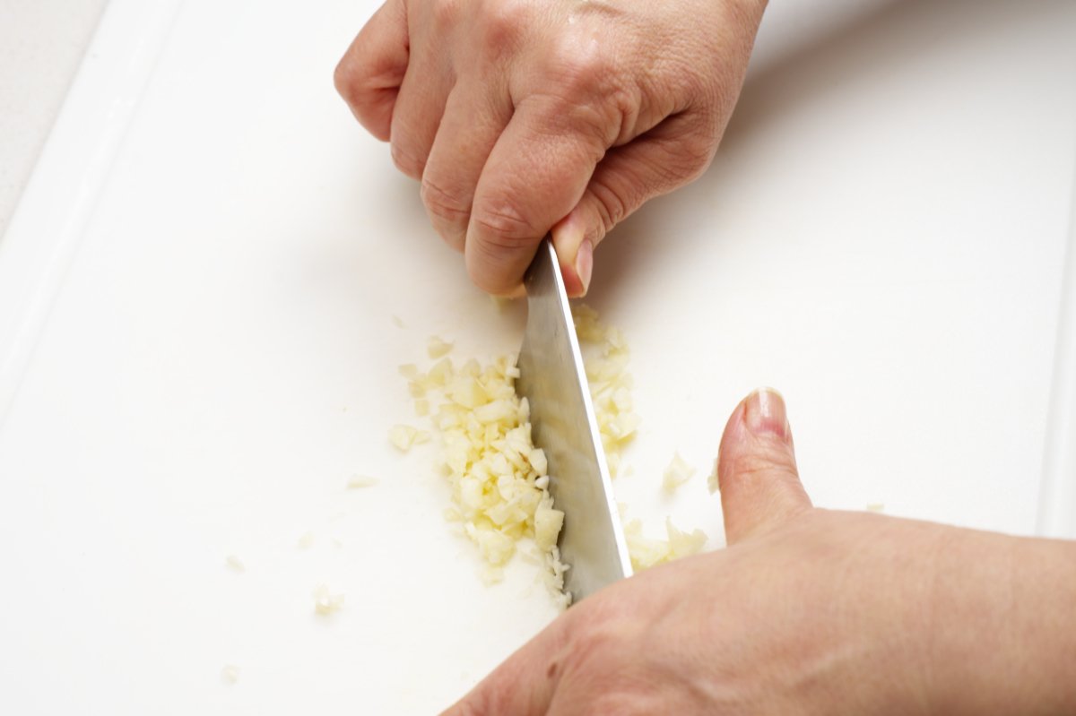 mincing garlic for dan dan noodles