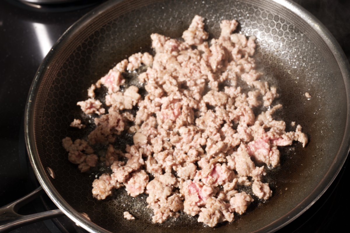 breaking pork until small bits