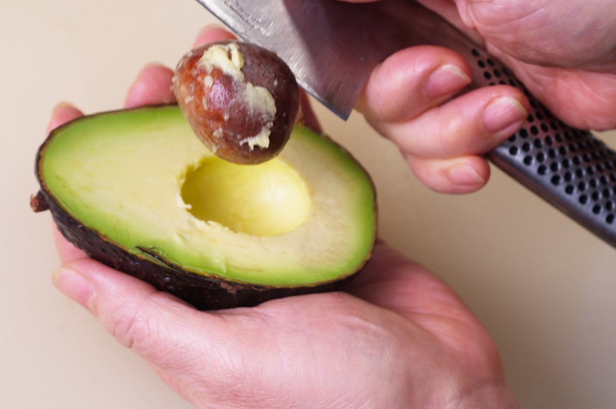 removing avocado seed for california rolls