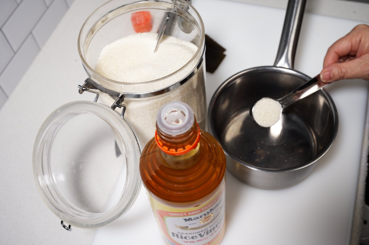 mixing up the sushi vinegar california rolls