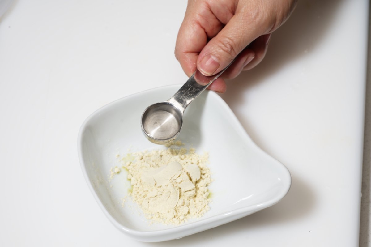 mixing wasabi powder for rolls