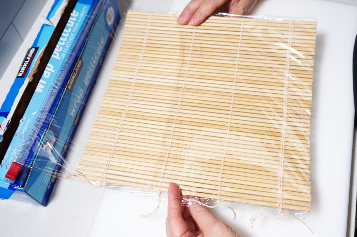 wrapping mat in plastic for California rolls