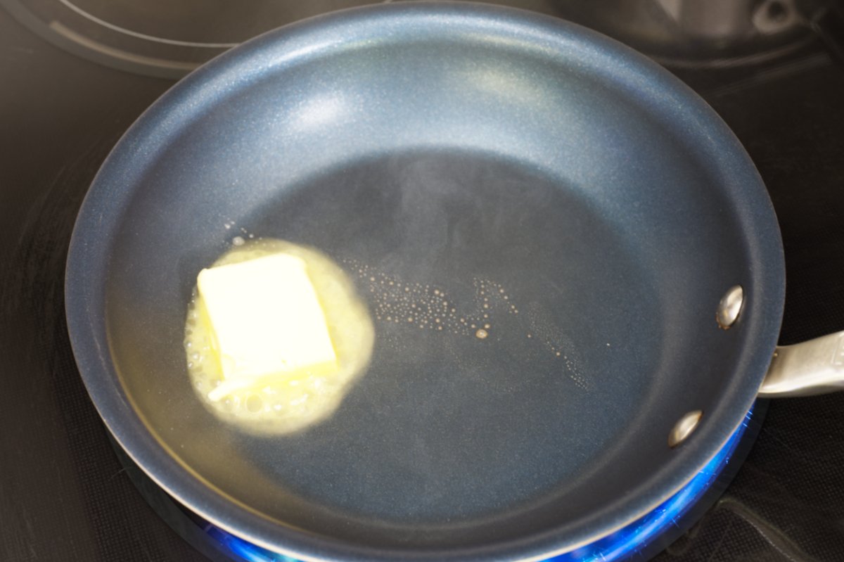melting butter in pan for korean honey butter corn