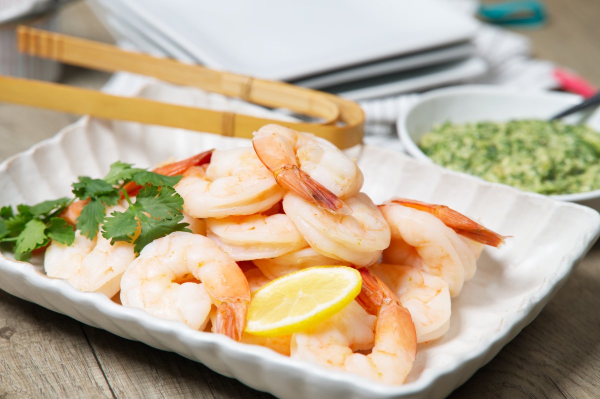 serving the chilled shrimp with asian pesto