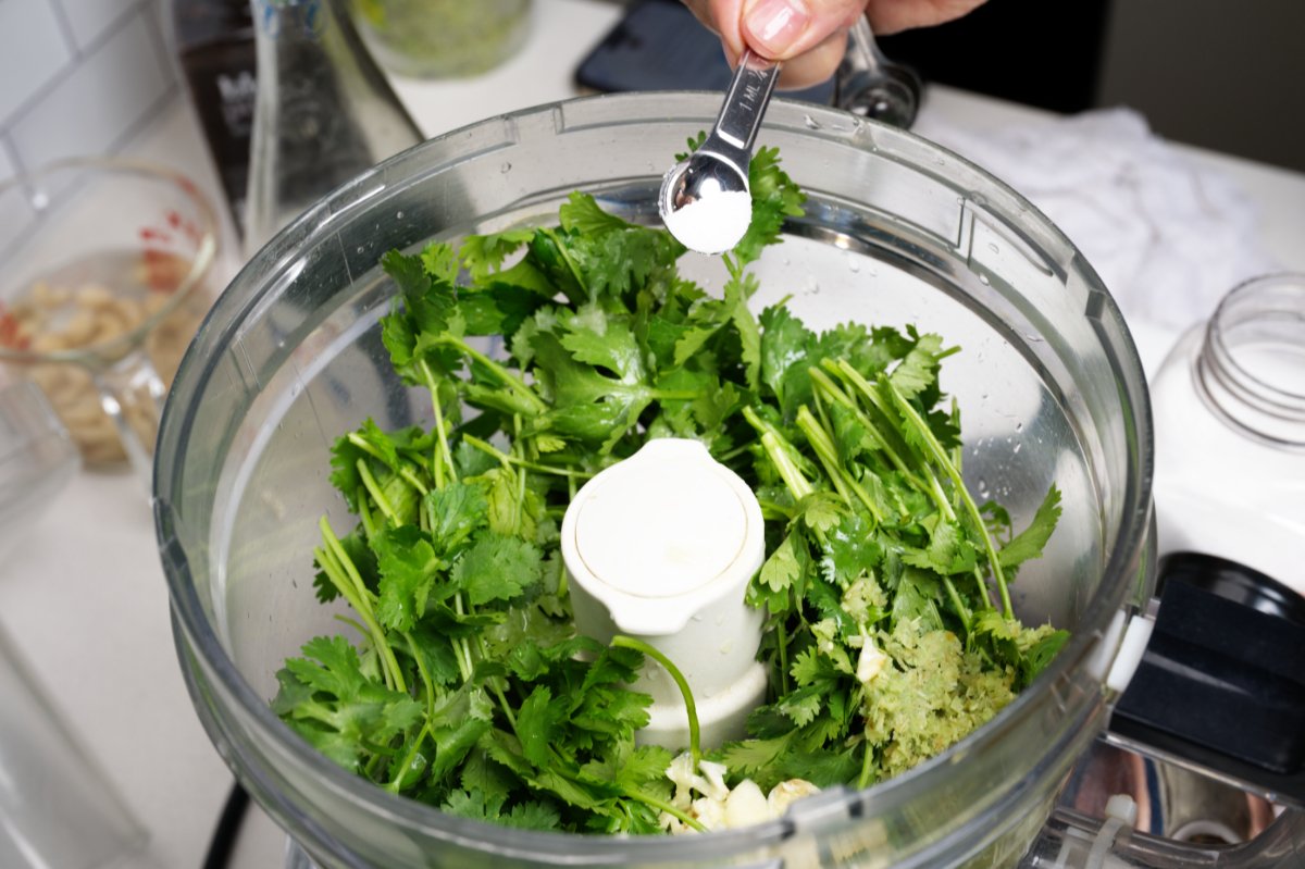 adding salt chilled shrimp with asian pesto