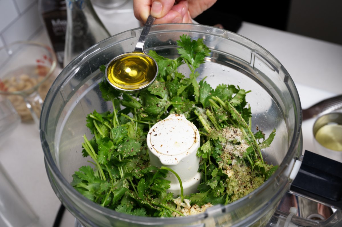 adding oil chilled shrimp with asian pesto
