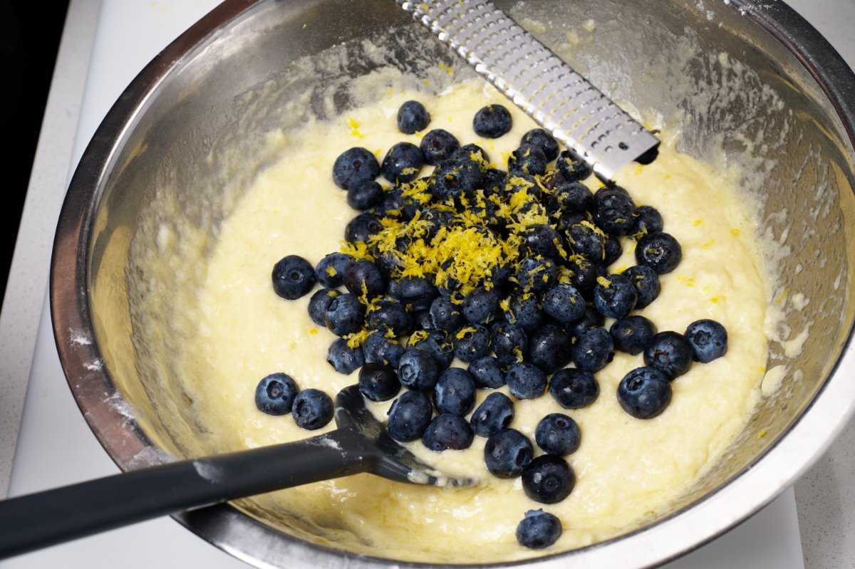 adding zest to blueberry muffins