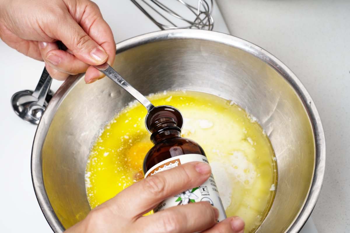 adding vanilla blueberry muffins