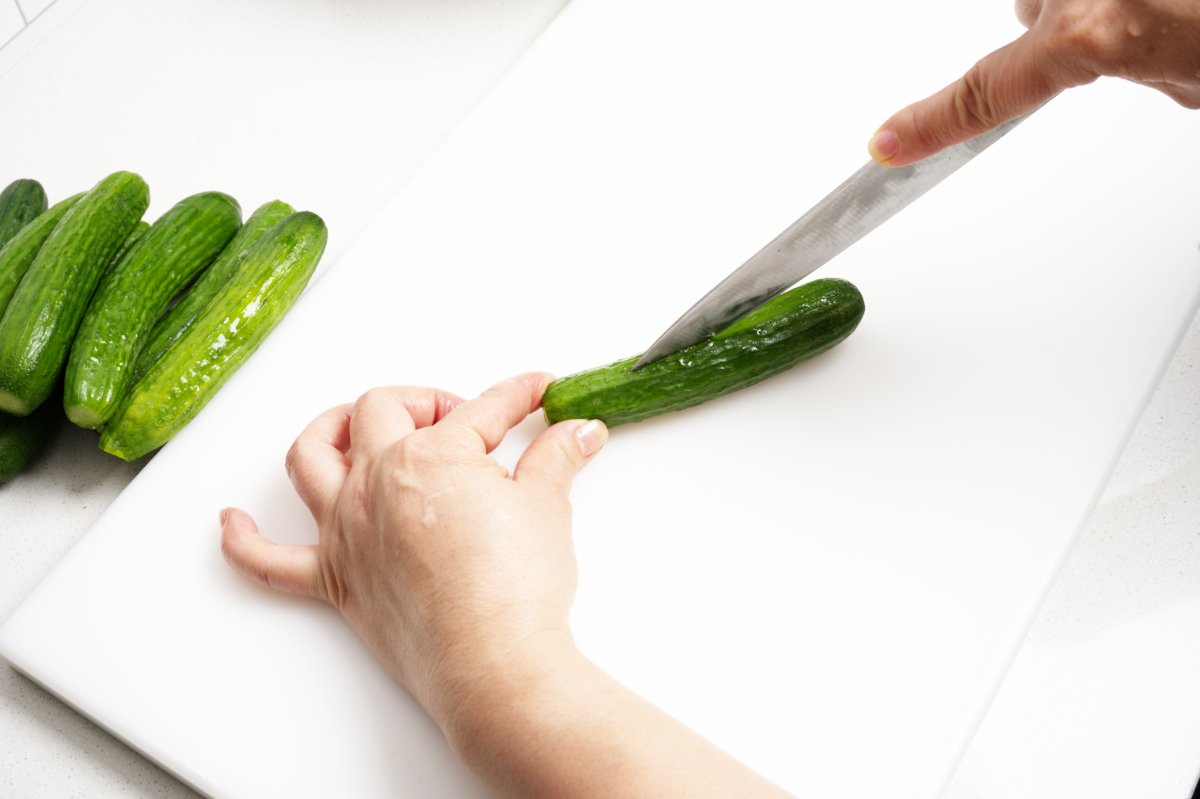 slicing the cucumber lengthwise