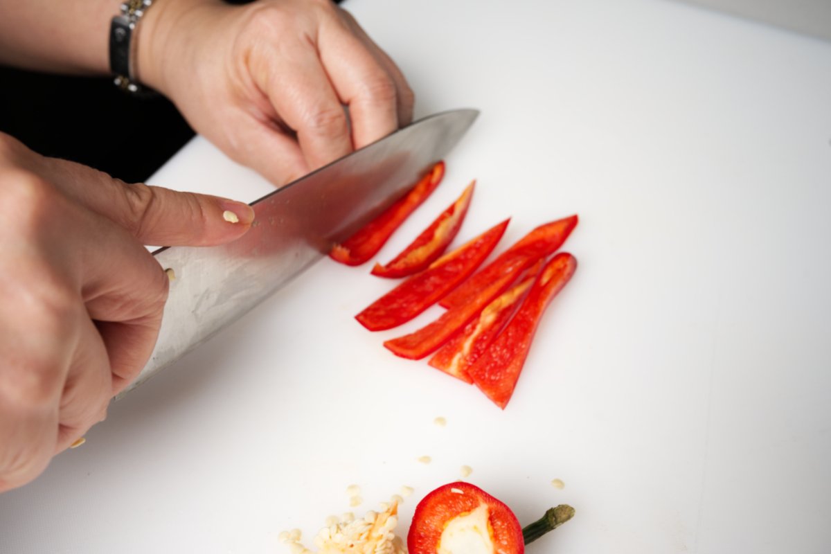 cutting chili into strips Chinese-style eggplant salad