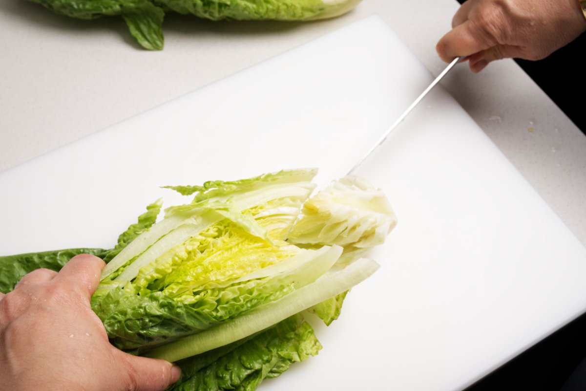 cutting out core of romaine for kale caesar salad