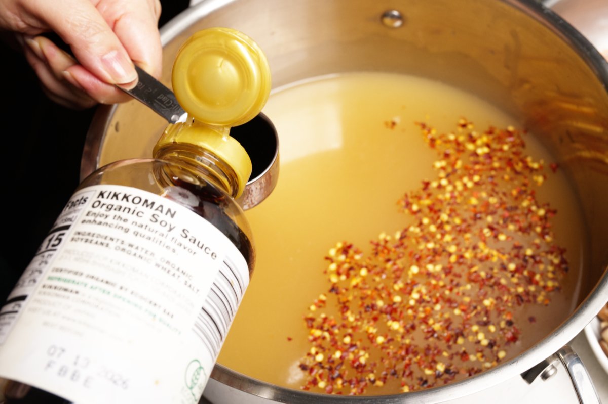 adding soy sauce