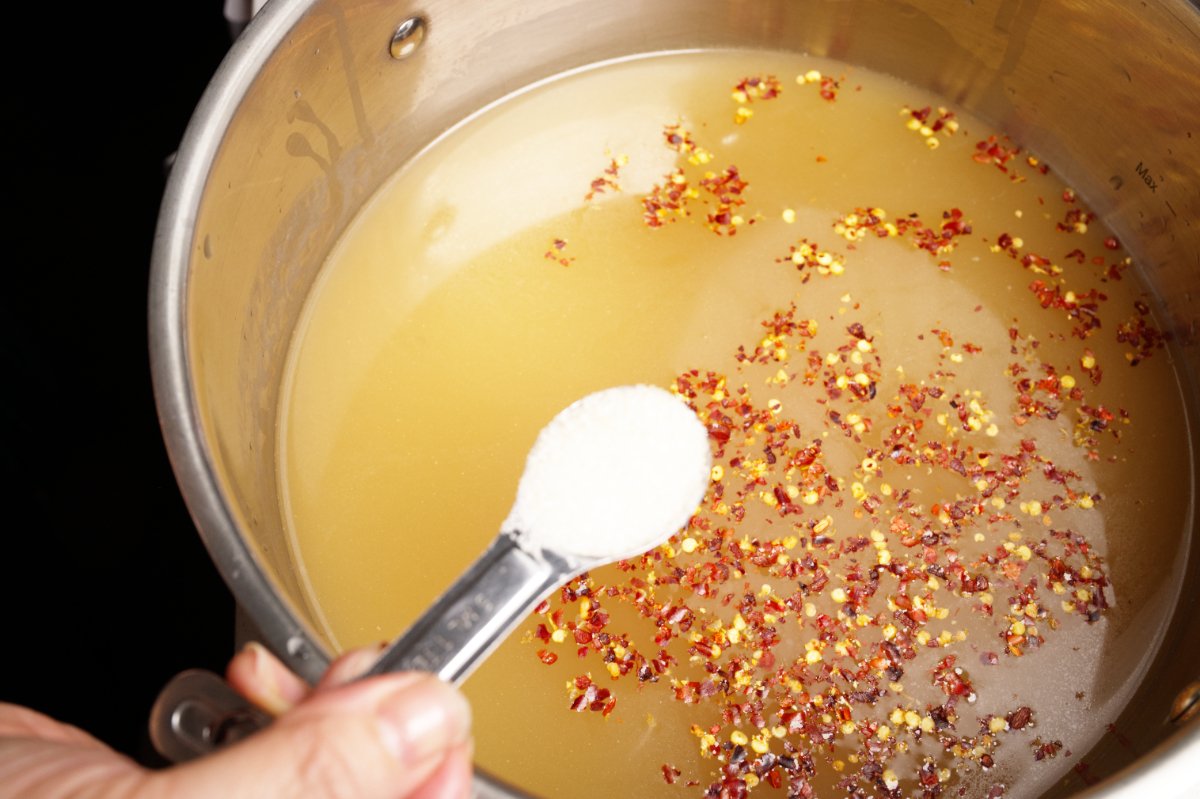 adding sugar to soup