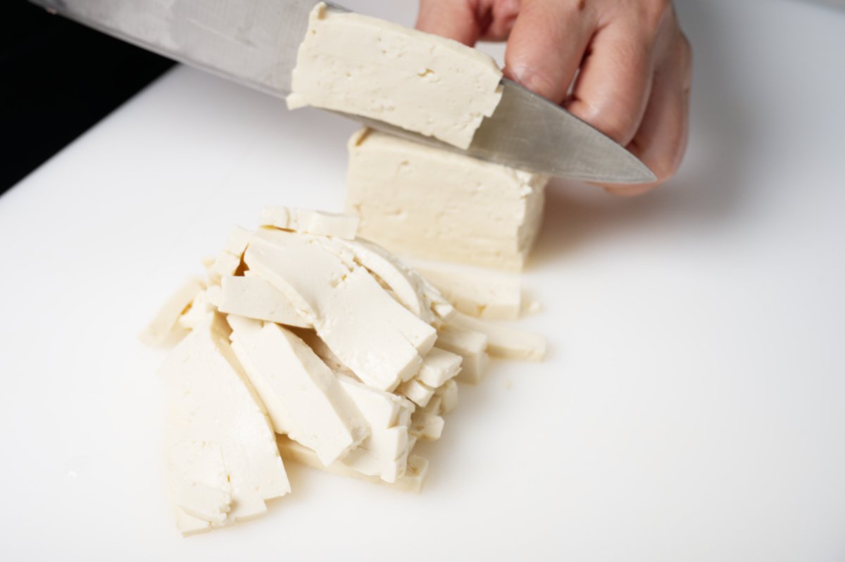 cutting tofu strips for hot and sour soup