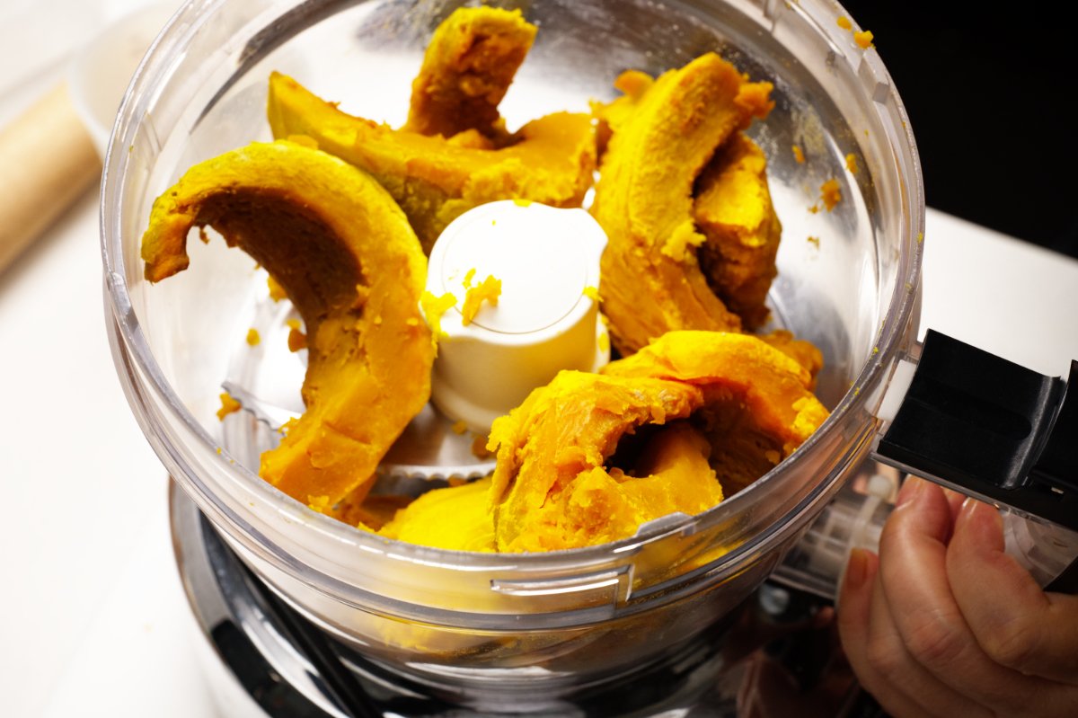 adding kabocha to food processor