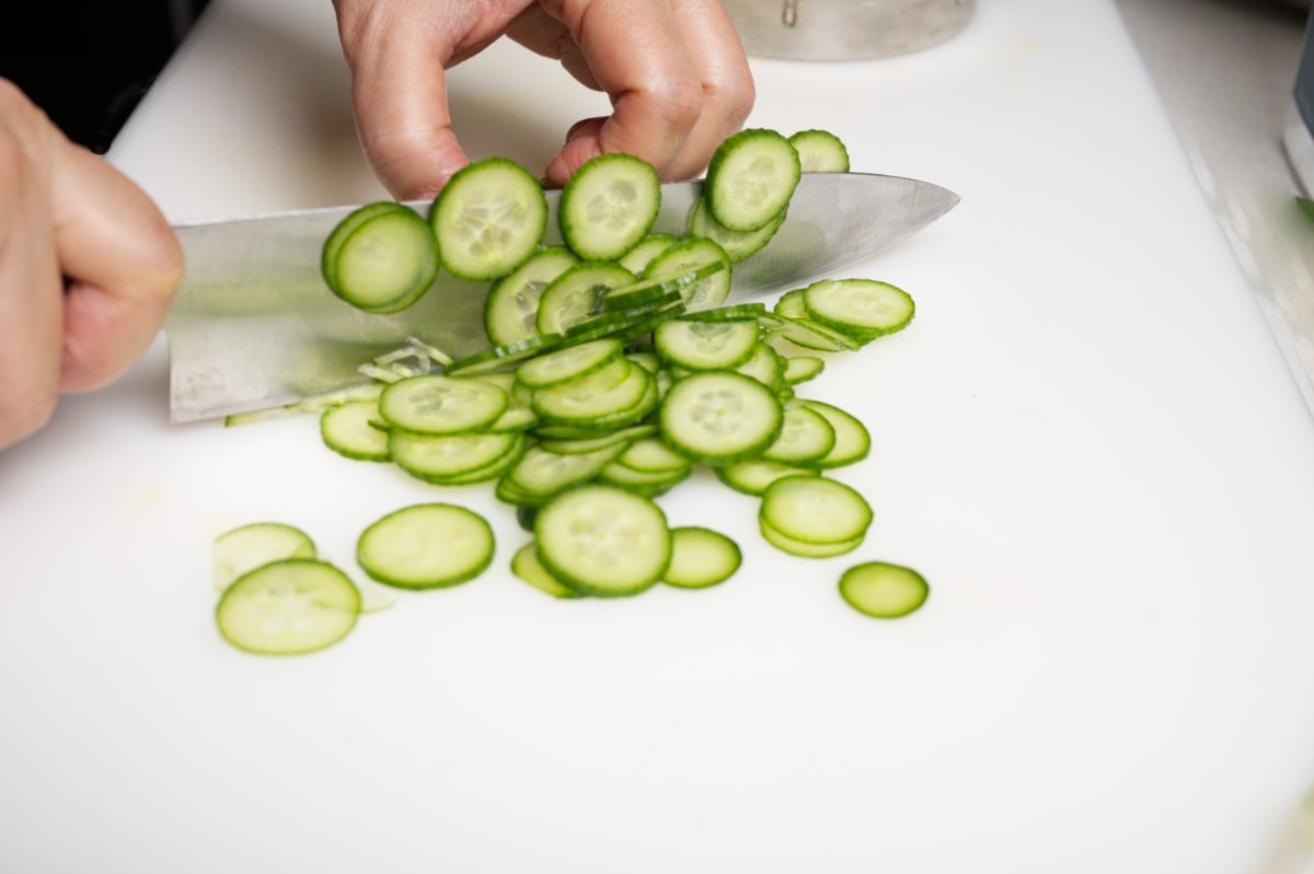thinly slicing cucumbers for salad