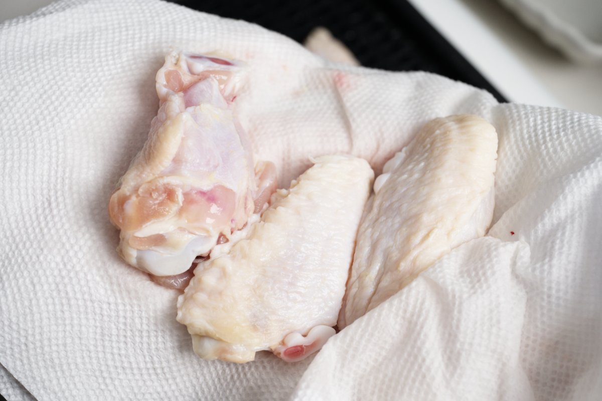 drying the wings with paper towel