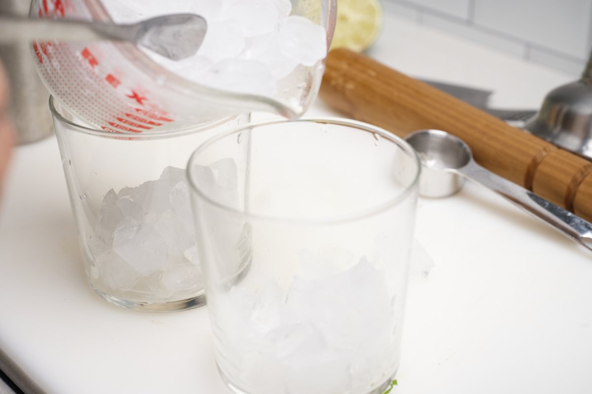 putting ice in glasses for sake mojito