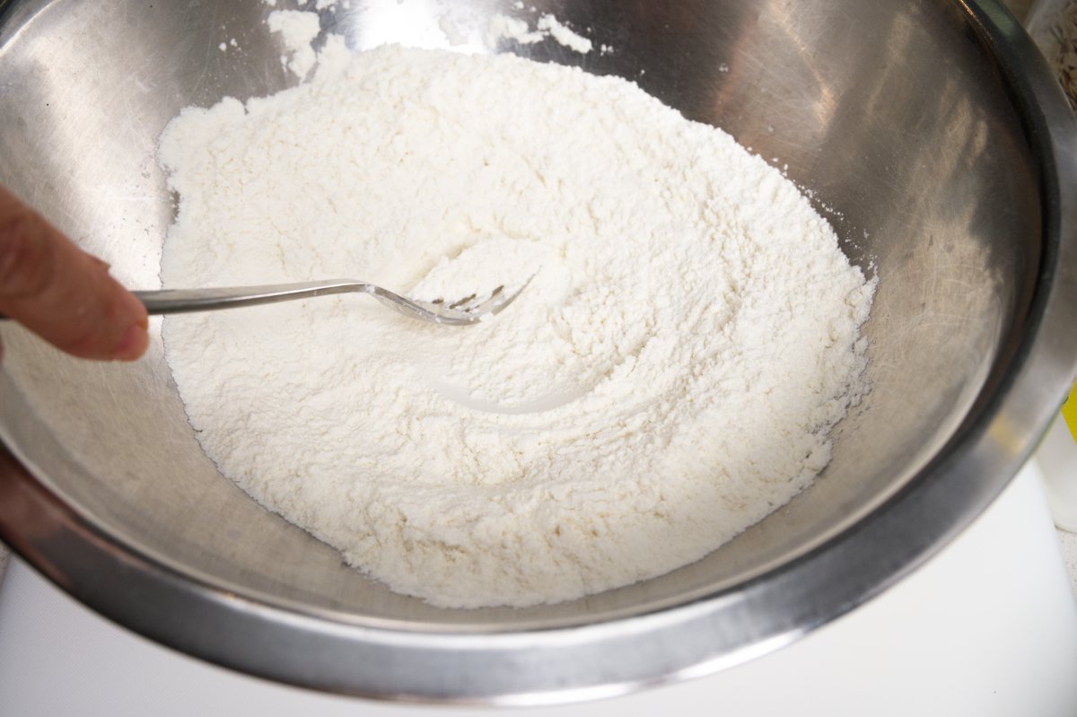 stirring dry igredients for healthy breakfast muffins