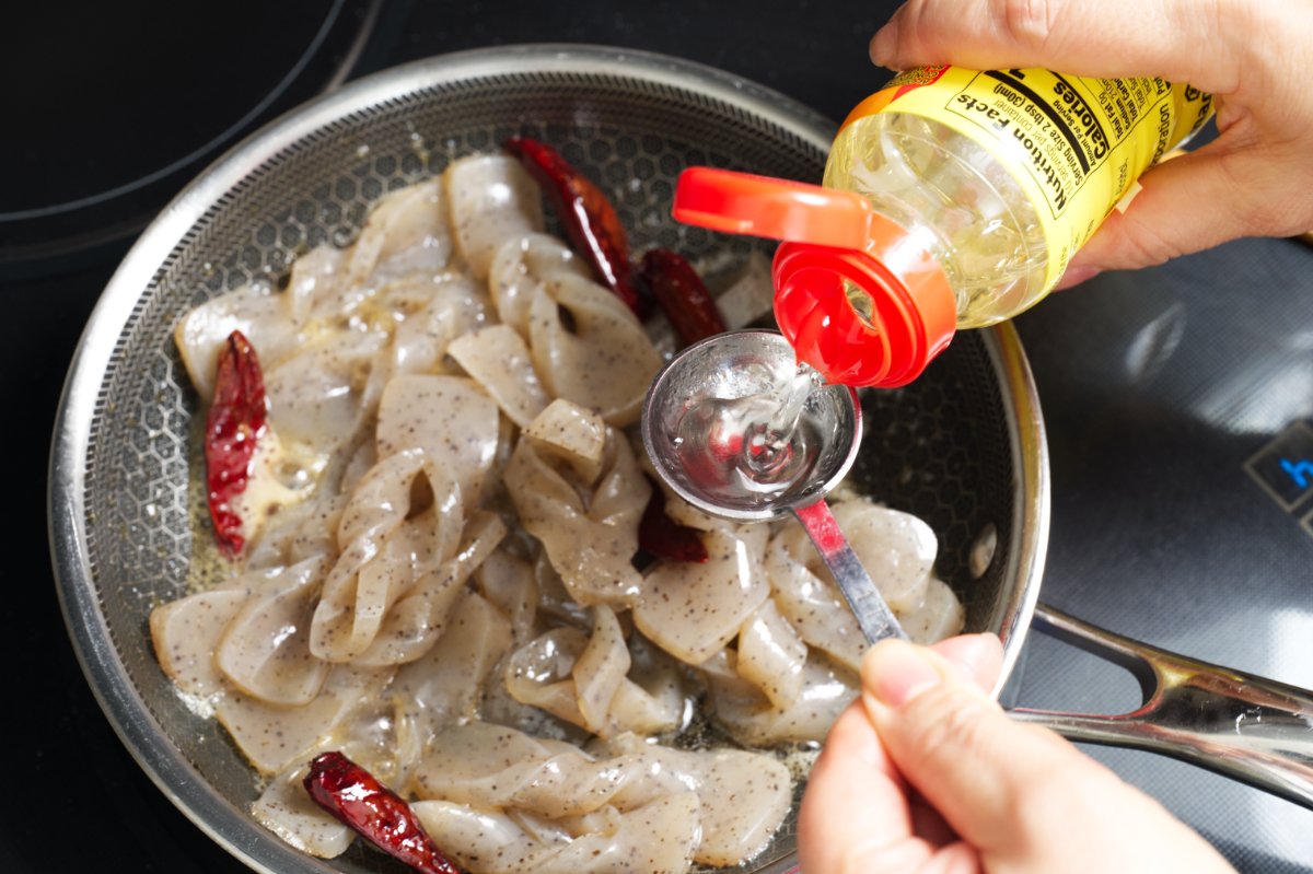 adding soy sauce