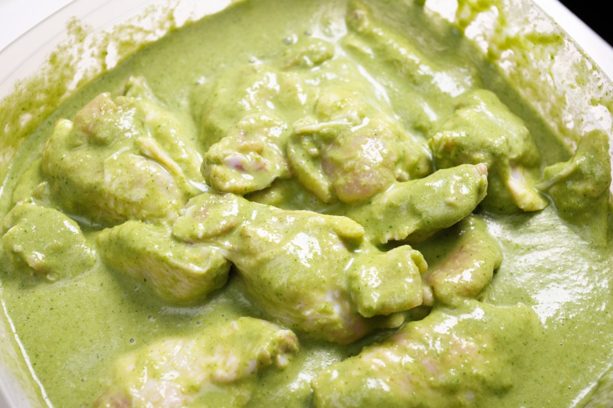 wings soaking in green curry marinade