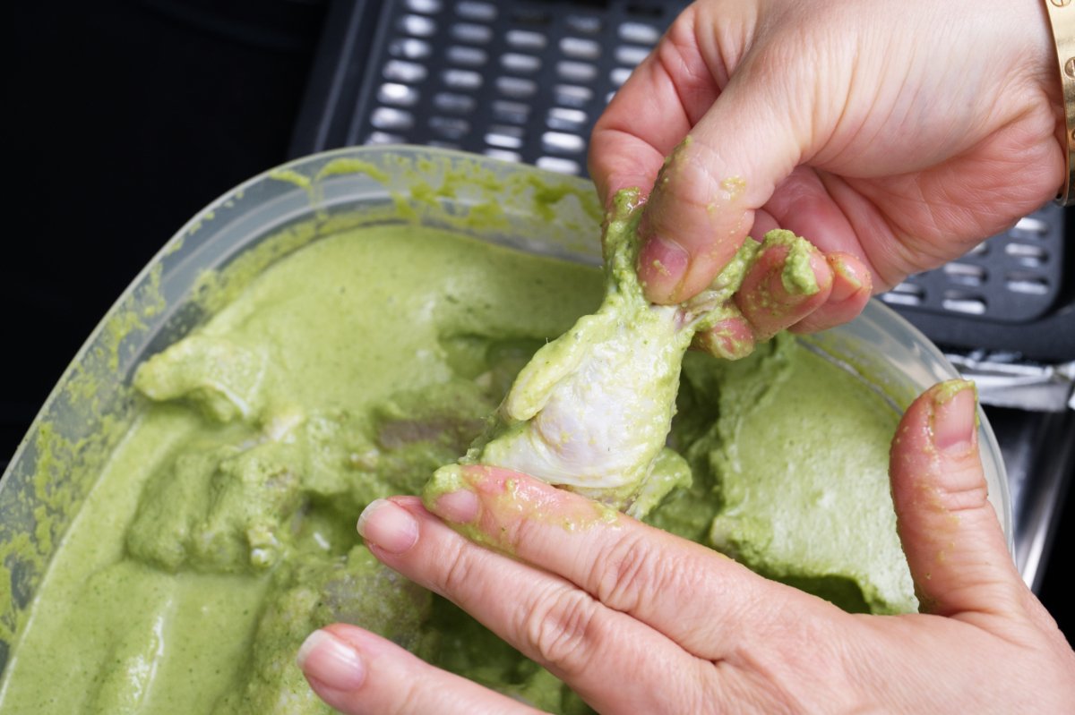 wiping off marinade